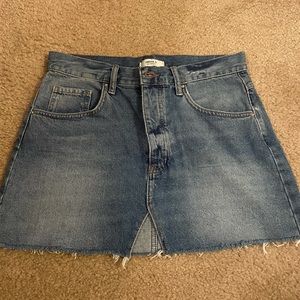 Buttons down Jean skirt. Slit in the front. Forever 21